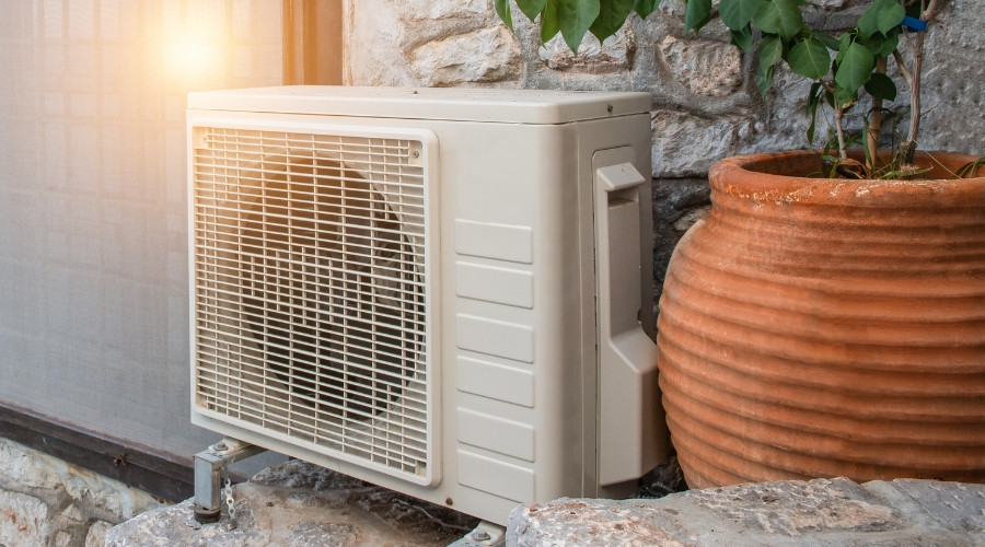 Heat pump exterior unit installation for home comfort and energy efficiency.